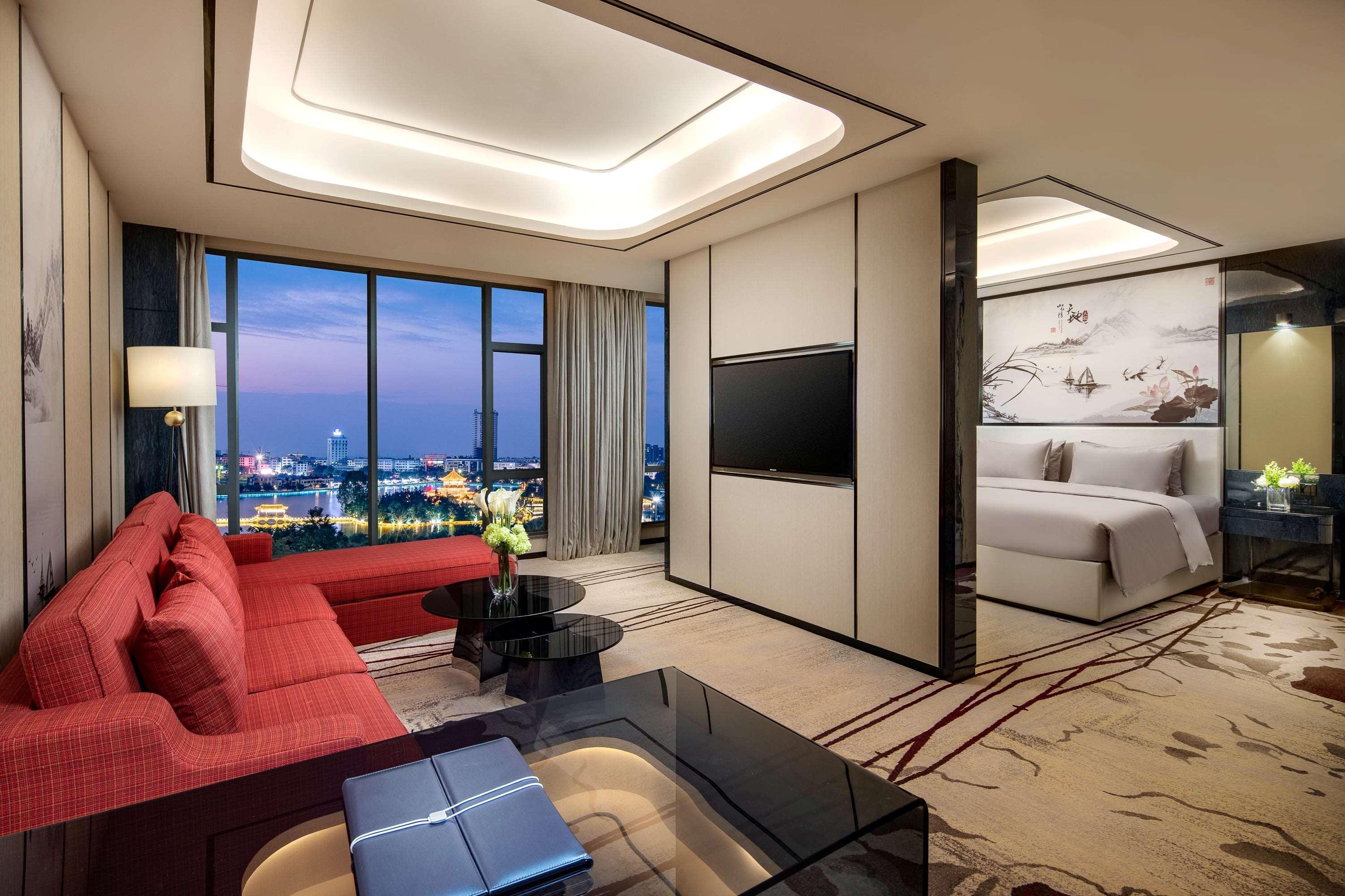 Ramada By Wyndham Mengzi Suites Buitenkant foto